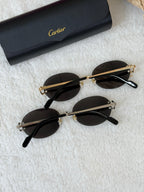Cartier Eyewear oval-frame Sunglasses